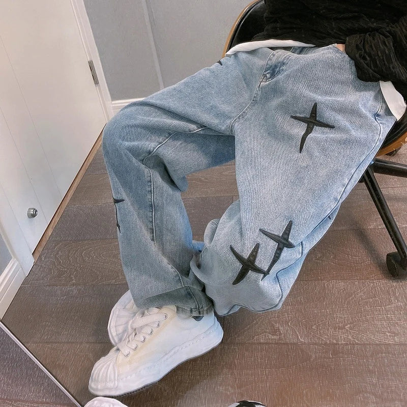 Calça Jeans Cross Stitch